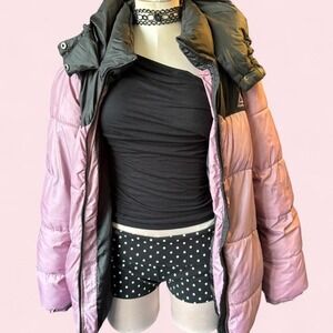 Vintage Reebok puffer jacket in a soft mauve pink and black colorway